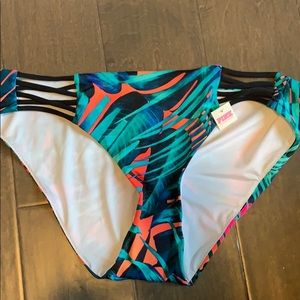 NWT swim bottoms, multicolored leaf pattern